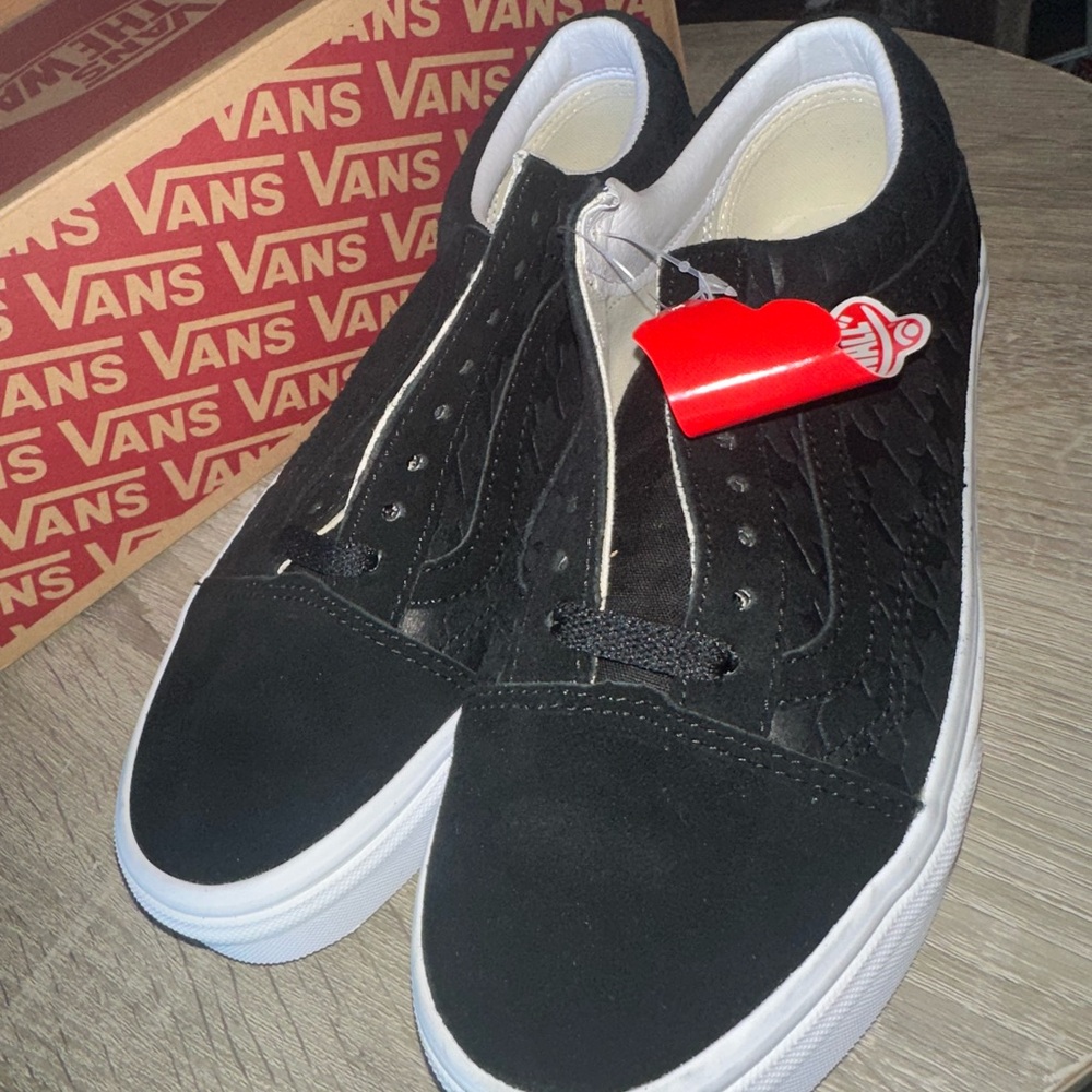 Vans Black and White Quilted Slip-On Sneakers